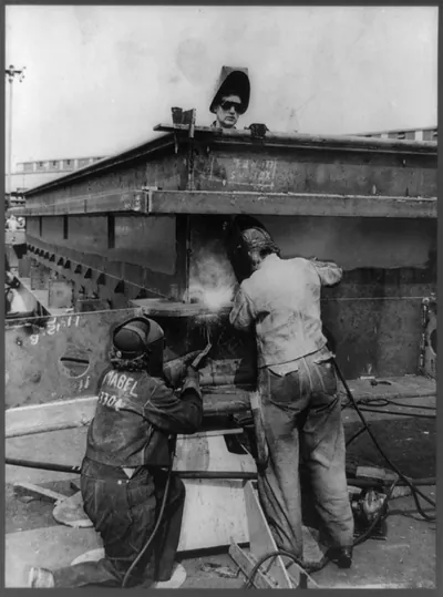 Women welding up a hatch, Portland, Oregon