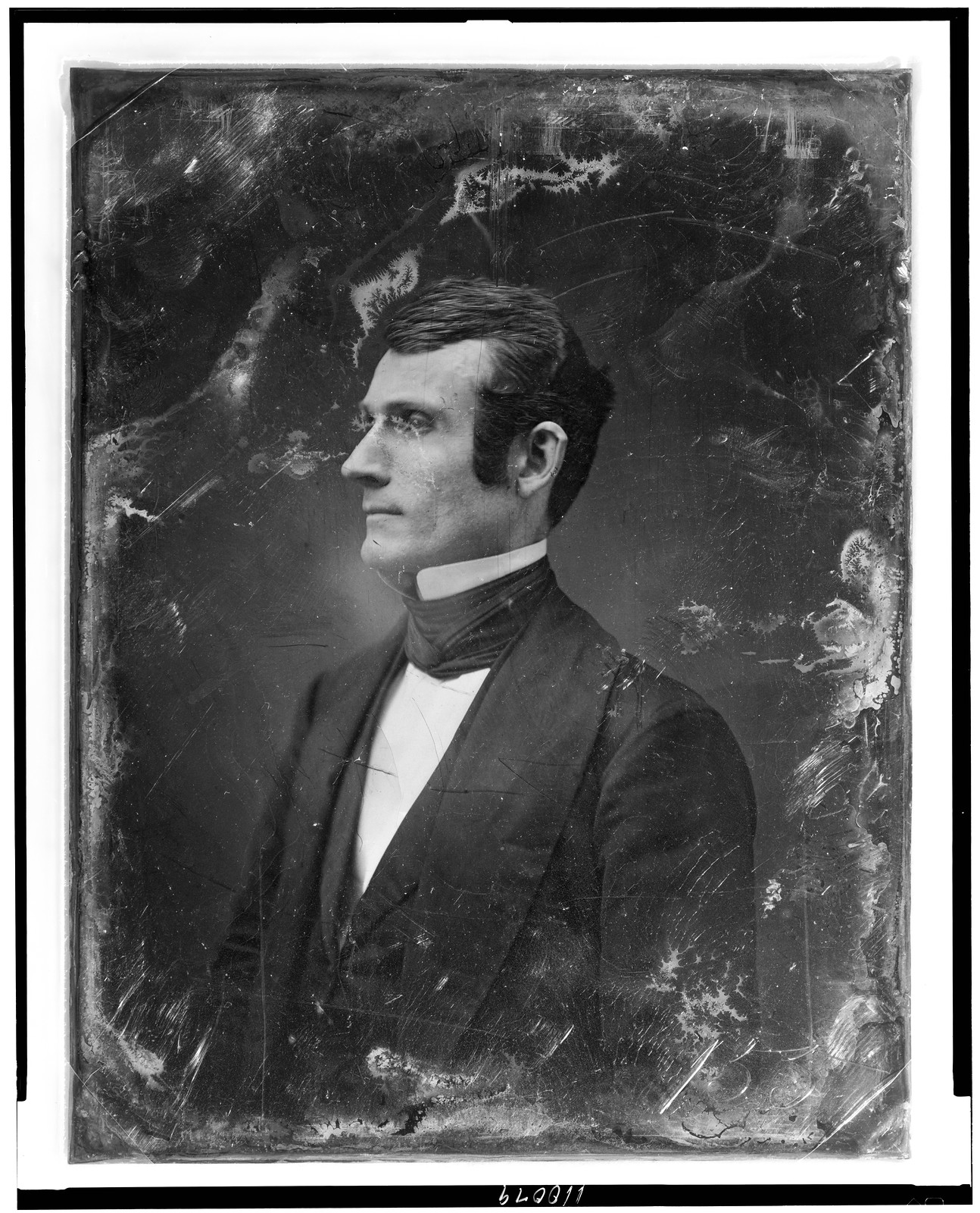 Profile portrait of a man in dark suit, daguerreotype, 1844 — historic photograph