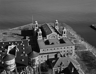 Aerial black and white view of main building and water towers