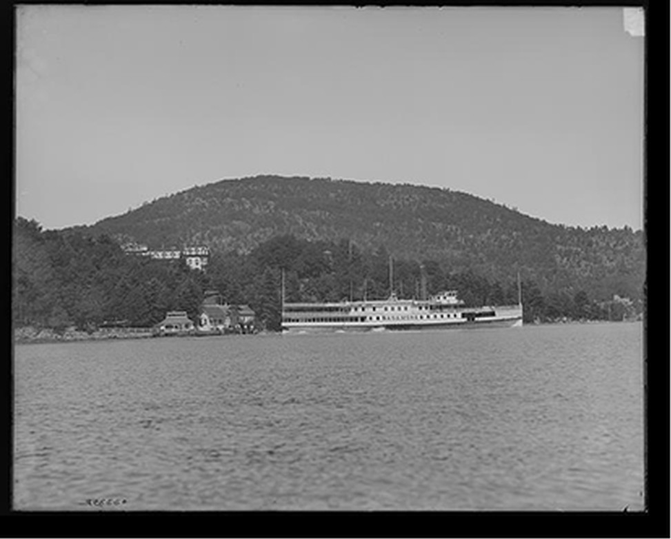 [Lake George, N.Y., steamer leaving Rogers' Rock Landing], [between 1890 and 1910] — historic photograph