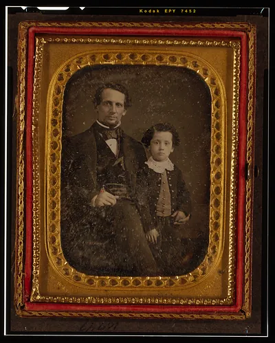 [Unidentified man and boy]