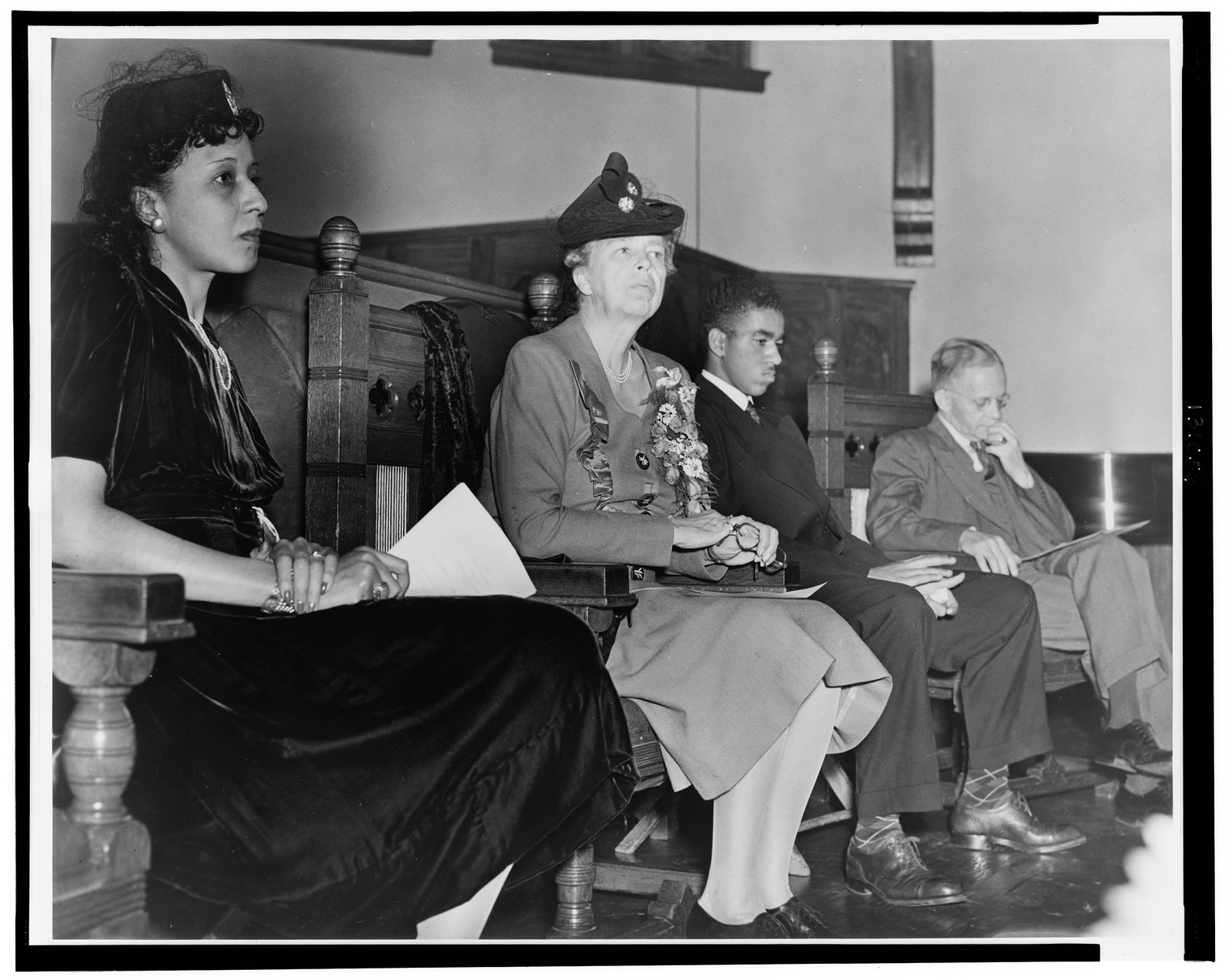 [Eleanor Roosevelt seated in a church with other speakers, Ruby Hurley on the left and Walter F. White on the right, at an NAACP meeting or program] / G. Marshall Wilson., [195-] — historic photograph