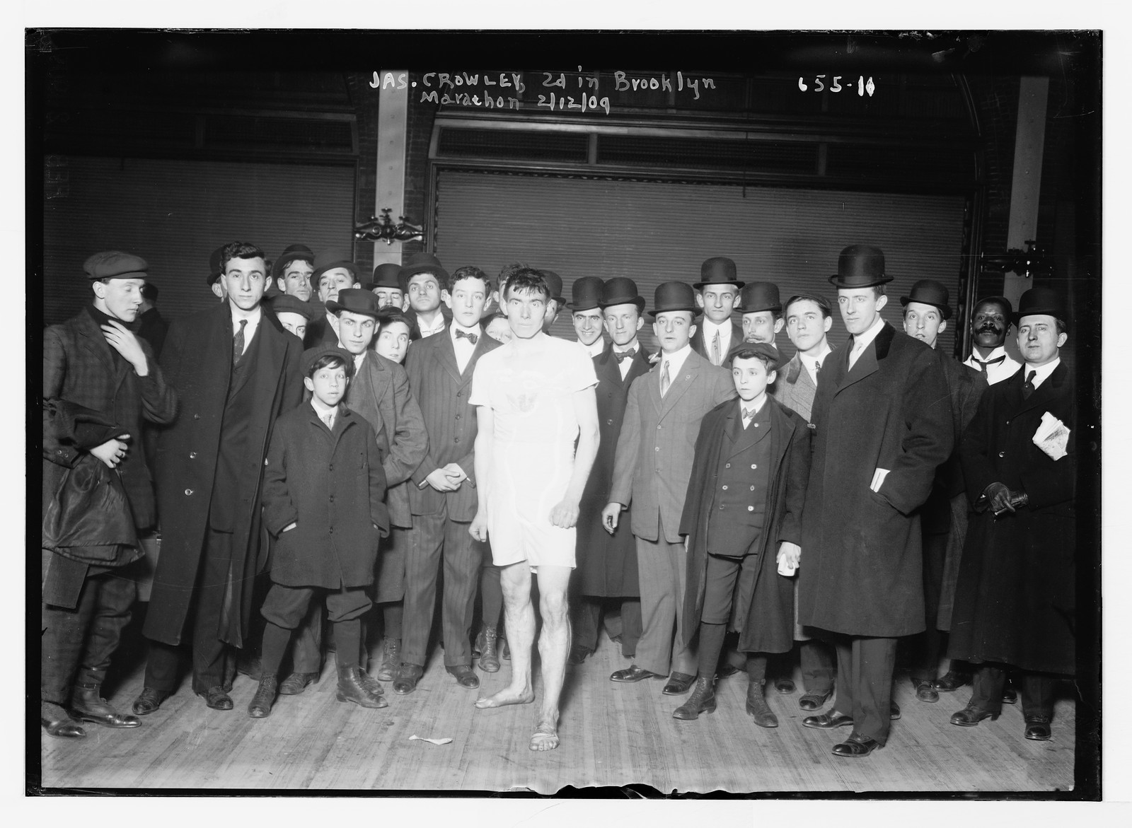 Jas. Crowley, 2nd in Brooklyn Marathon, with others, New York, 2/12/09. — historic photograph