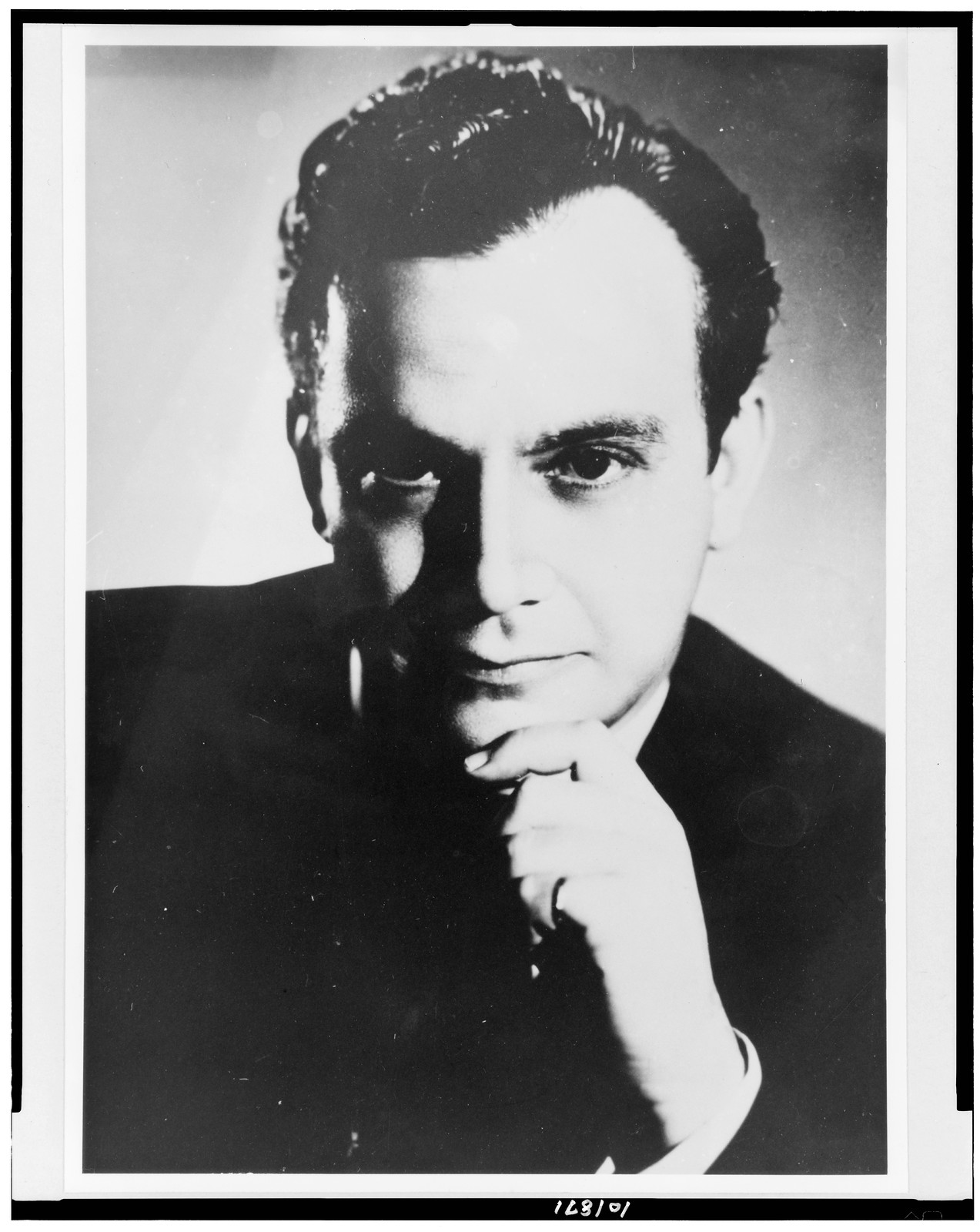 [Chico O'Farrill, conductor, head-and-shoulders portrait, facing front], [ca. 1950] — historic photograph