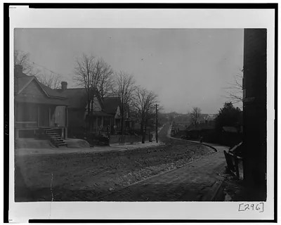 [Exterior view of houses along unpaved street, Greensferry Ave., N.W., Atlanta, Georgia]