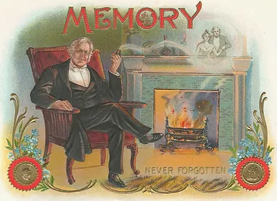 Cigar box label reading 'Memory, Never Forgotten' with seated gentleman