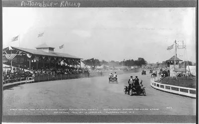 First annual fair of the Richmond County Agricultural Society. Automobiles passing the grandstand