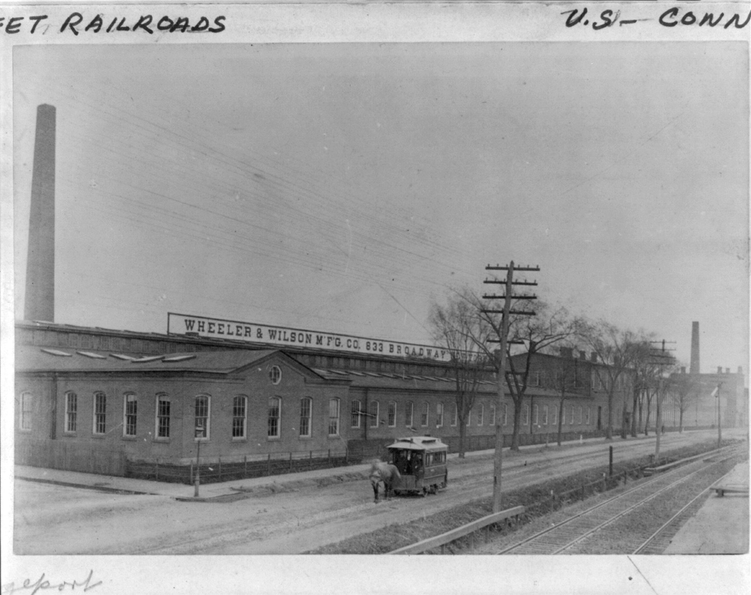 [Horse-drawn street railroad car in front of Wheeler & Wilson Mfg. Co., 833 Broadway, Bridgeport, Conn.], [no date recorded on caption card] — historic photograph