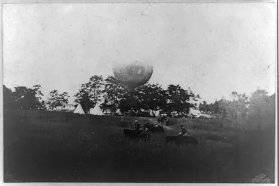 [Prof. Thaddeus Lowe's Balloon Camp" at Gaines Mill May 1862: balloon in backgrd. across field; horsemen in foregrd.]"