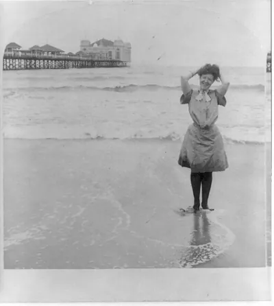 [Atlantic City, N.J. bathers wading: girl in glamorous, happy pose]