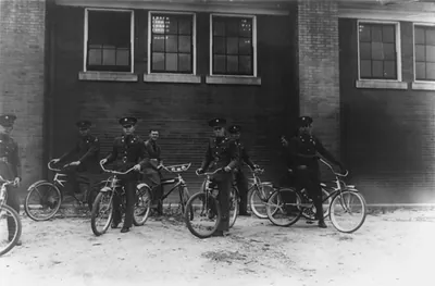 [Eight soldiers with bicycles at Ft. Francis E. Warren, Wyoming]