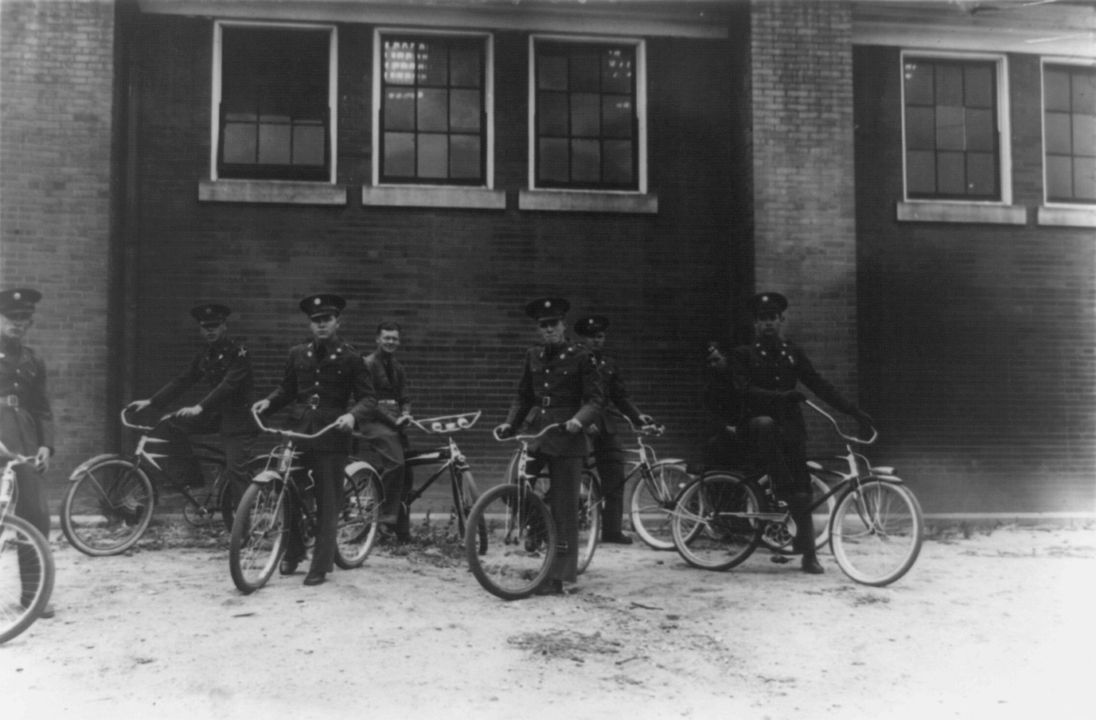 [Eight soldiers with bicycles at Ft. Francis E. Warren, Wyoming], 1939 — historic photograph