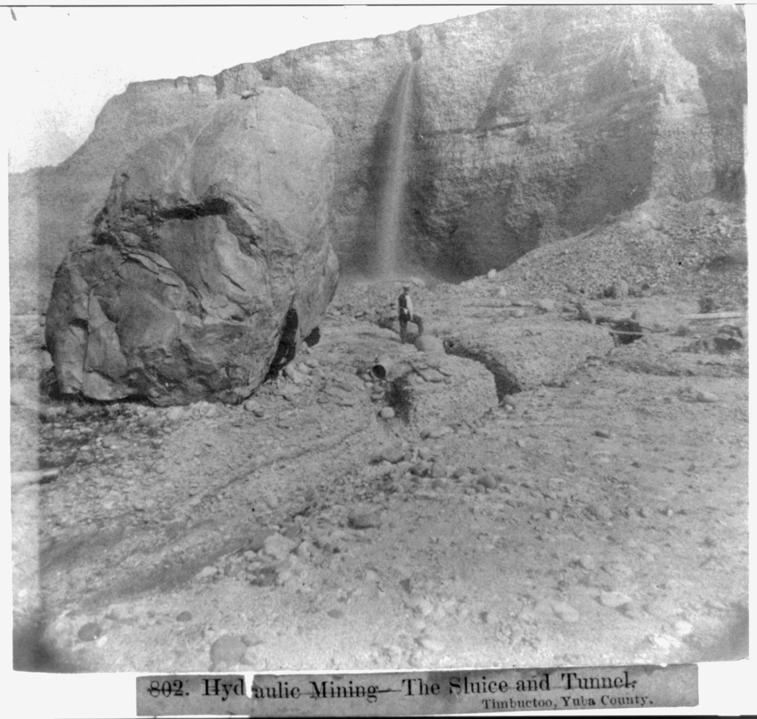 Hydraulic mining - the big boulder, Kentucky Claim, Timbuctoo, Yuba County, [published 1866] — historic photograph