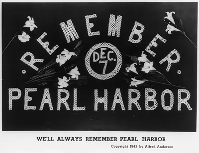 [2 patriotic slogans c1942 by Alfred Anderson: We'll always remember Pearl Harbor"; same as 49724 but without the "Vs" and with more white lilies]"