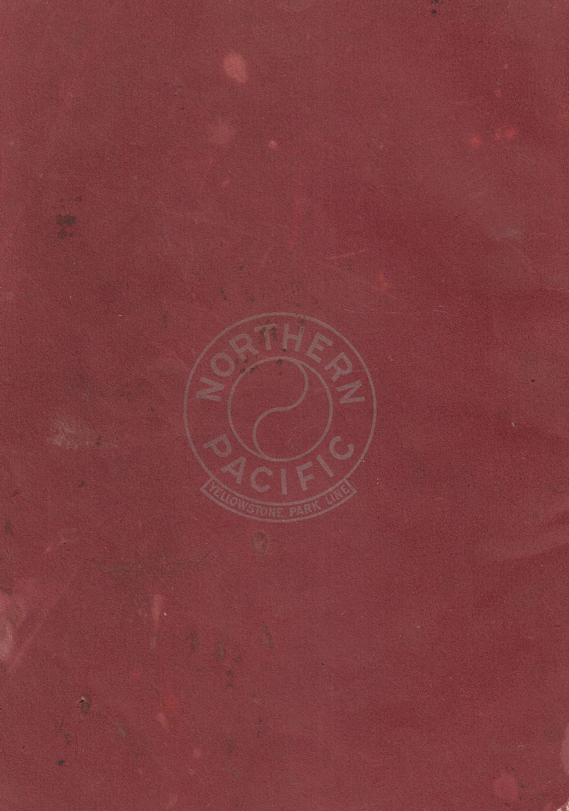 Northern Pacific Yellowstone Park Line embossed cover emblem on red card — historic image