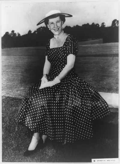 [Mary Mamie" Doud Eisenhower seated outdoors facing front full-length portrait on Easter Sunday in Augusta