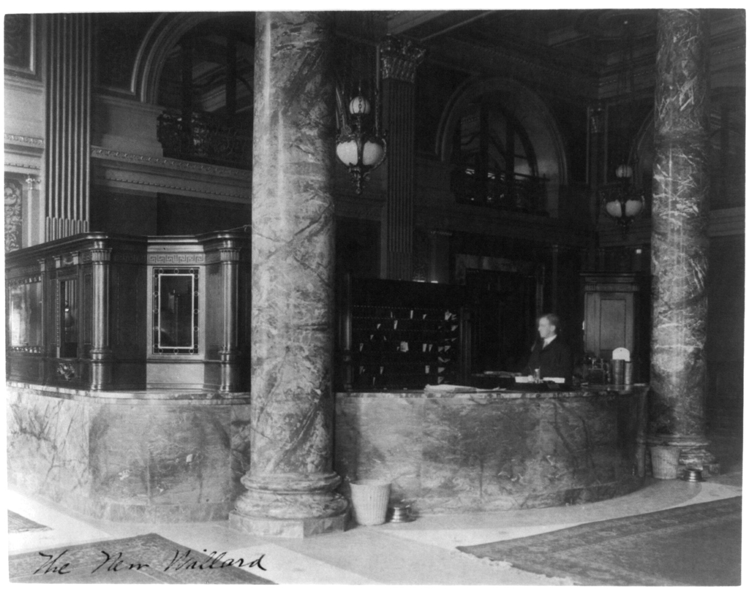 [The new Willard Hotel, Washington, D.C. - registration counter], [between 1890 and 1950] — historic photograph