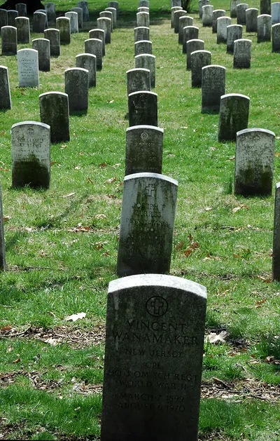 Rows of military headstones including Vincent Wanamaker, World War II