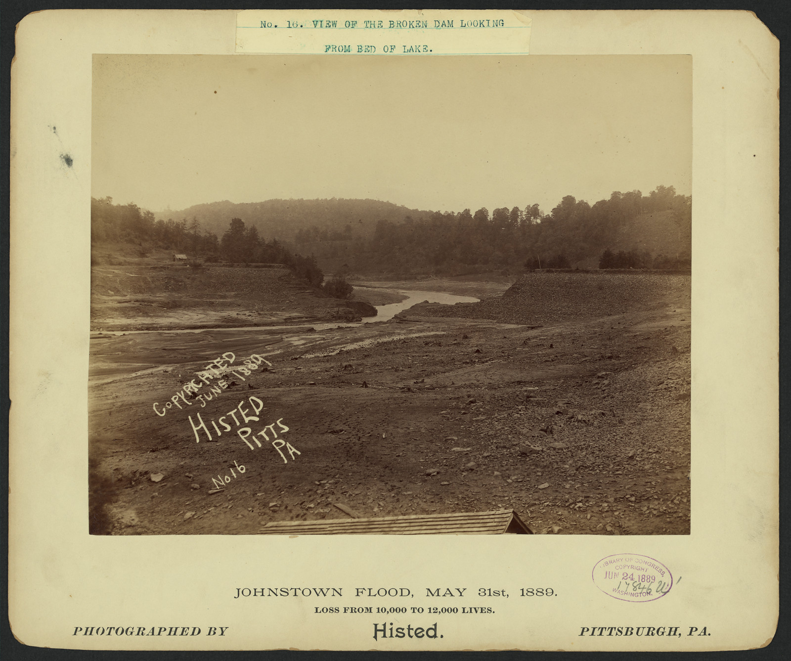 View of the broken dam looking from bed of lake, Johnstown Flood, May 31st, 1889, 1889 — historic image