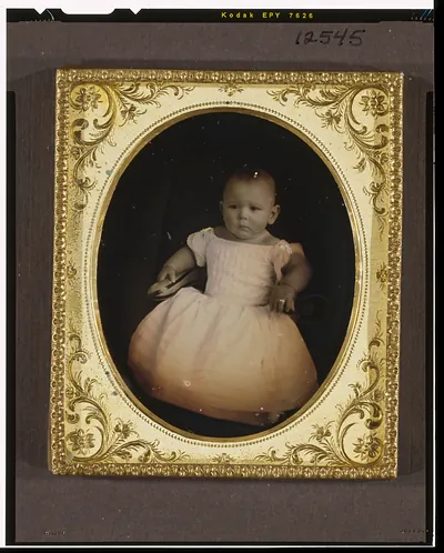 [Unidentified child, full-length portrait, facing left]
