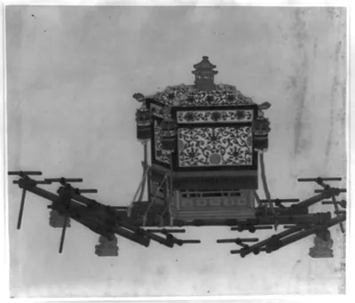 Carriage for a noble or wealthy man to be carried by eight persons [used in China]