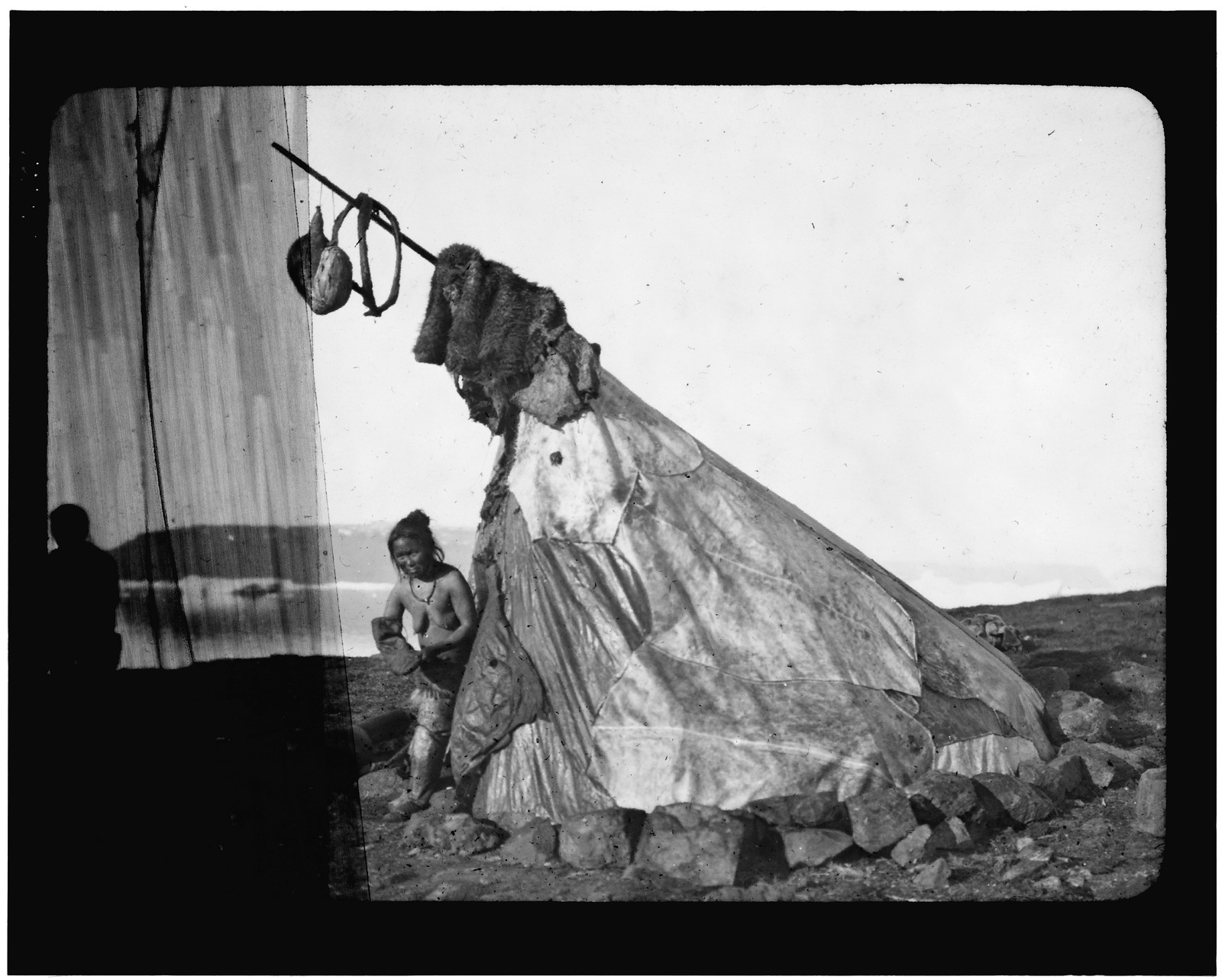 [Tent with Inuit woman standing in doorway, in Arctic regions], [1901] — historic print