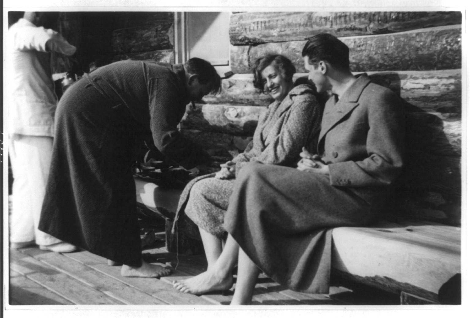 [Göring with Swedish guests in bathrobes on porch at Göring's home, Carinhall, E. Prussia], [193-] — historic photograph