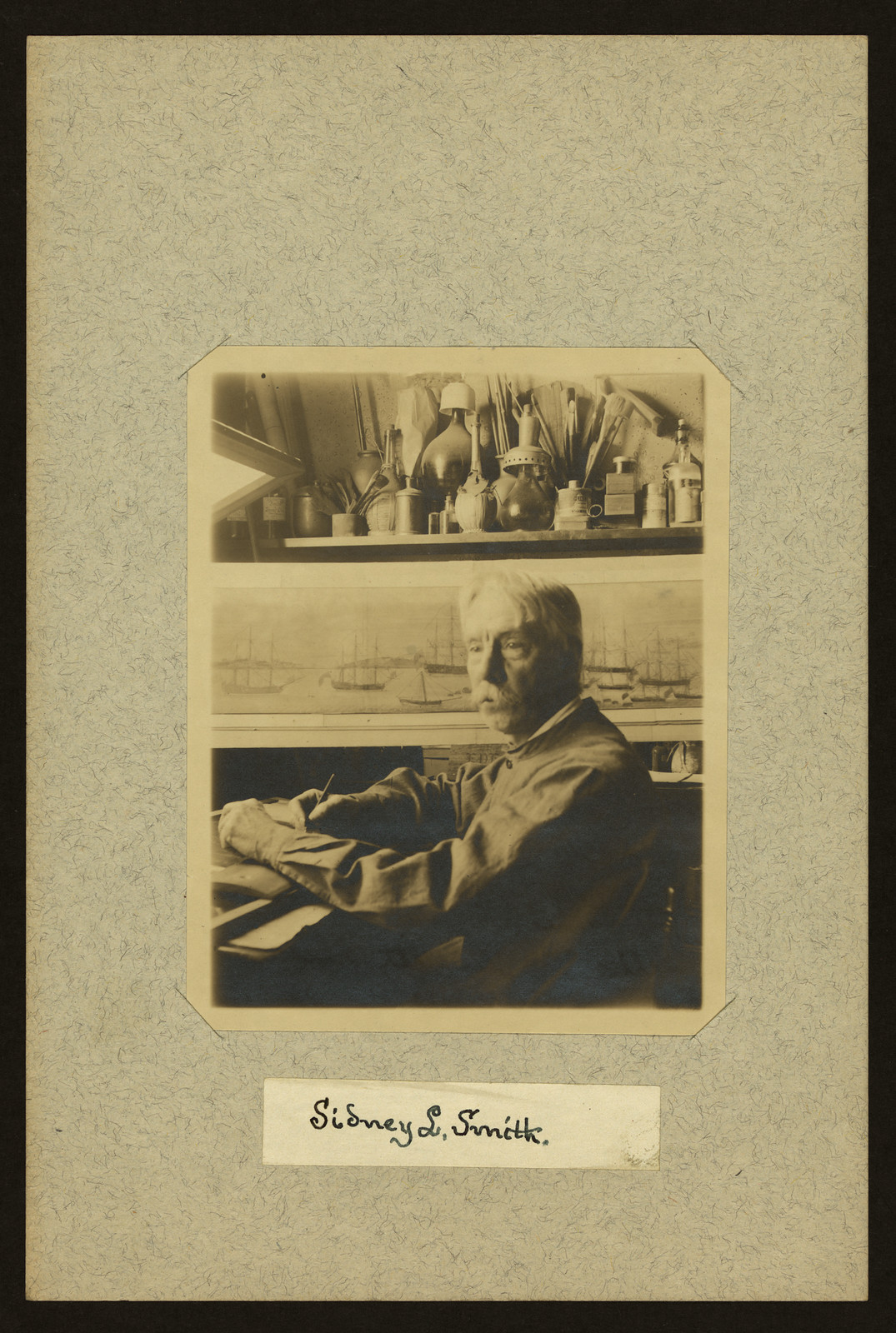 Sidney L. Smith, half-length portrait seated at desk — historic image