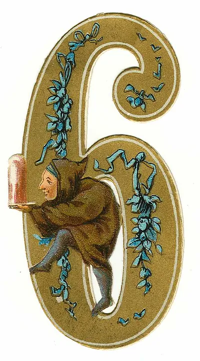 Decorative gold numeral 6 with gnome and blue ribbons