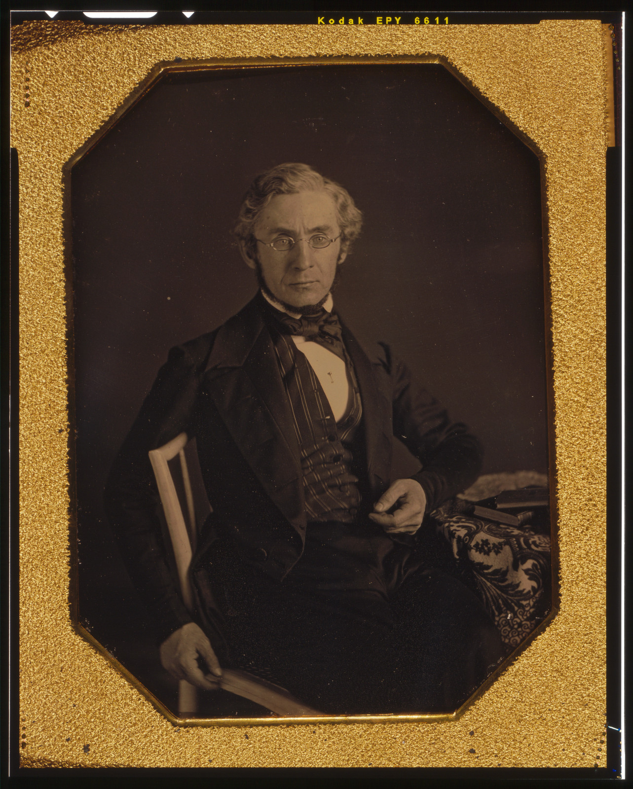 [William Young McAllister, three-quarters length portrait, seated in a chair, arm resting on table with tablecloth], [between 1848 and 1851] — historic photograph