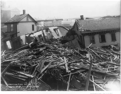 [Pa. - Johnstown - wreckage after flood, 5/31/'89: looking south from Main St." ruins of M.J. Kennedy Coal Co.]"