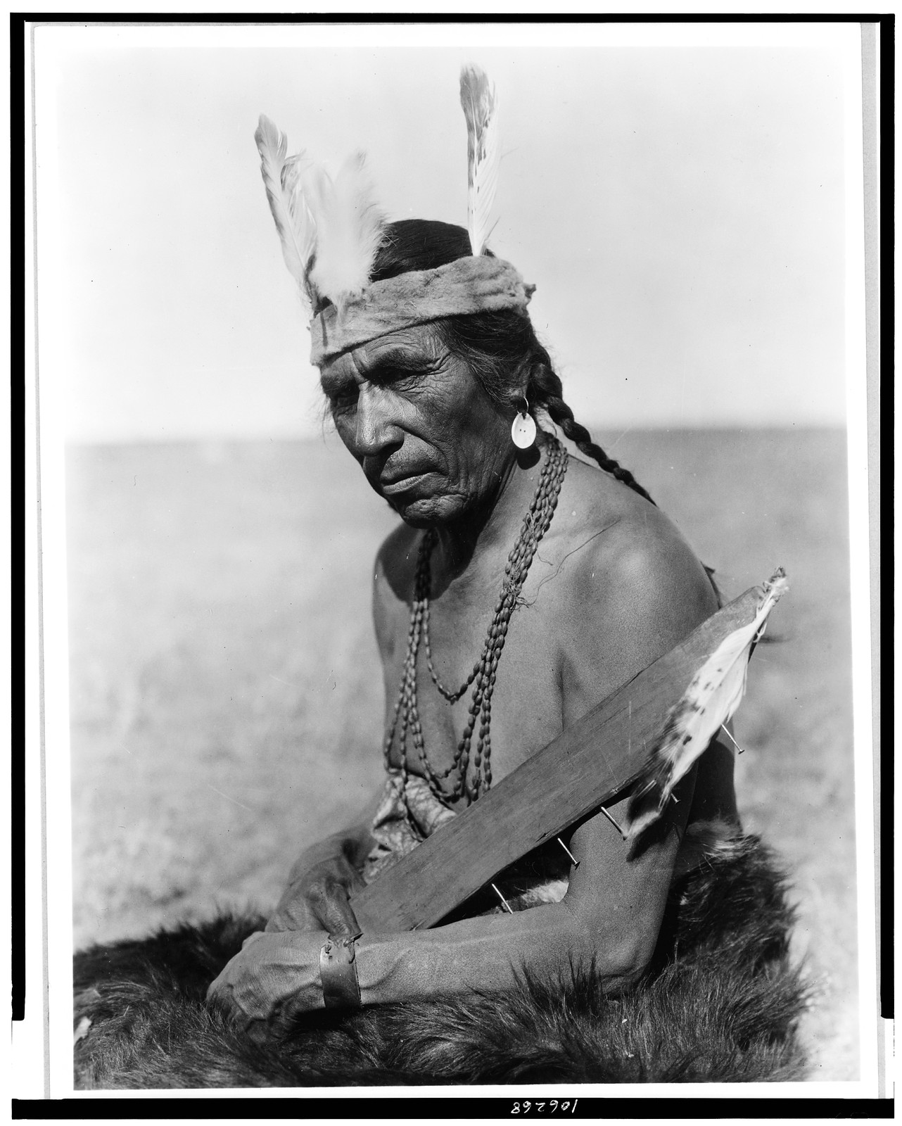 [Fat Horse with insignia of a Blackfoot soldier], c1927. — historic photograph