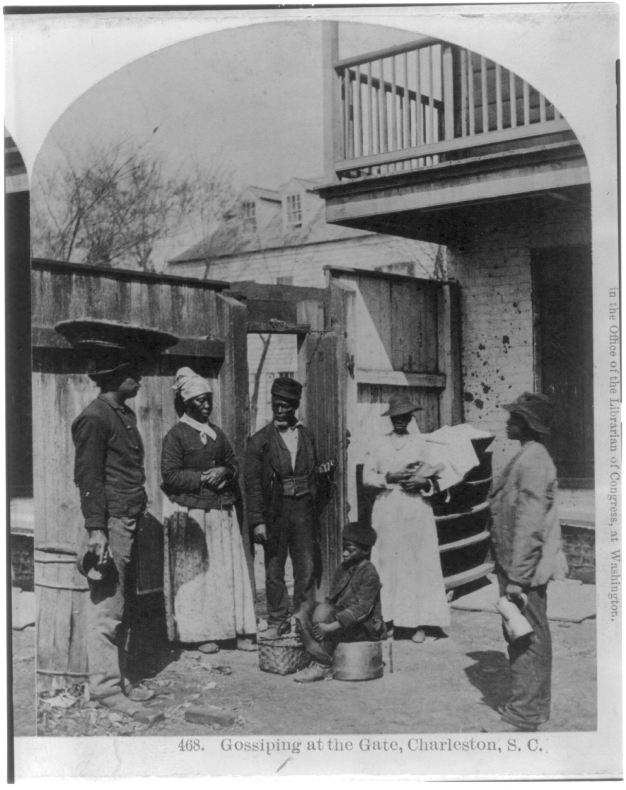 [African Americans working, Charleston, S.C.: Gossiping at the gate], c1879. — historic photograph
