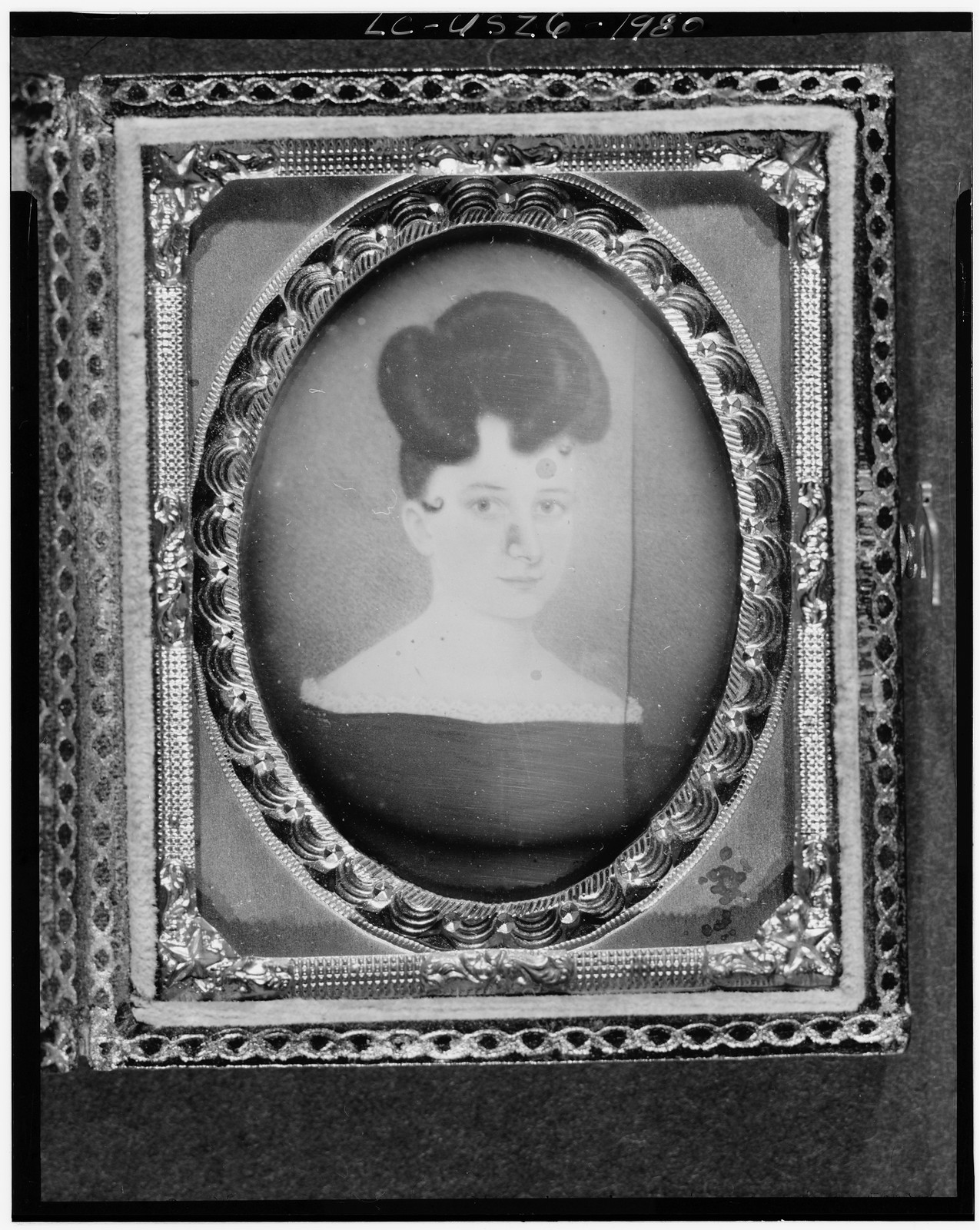Black-and-white photograph of a framed miniature portrait of a woman, 1840 — historic photograph