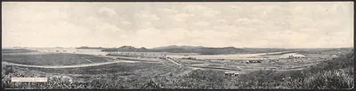 Panoramic view of harbor, hills and waterfront