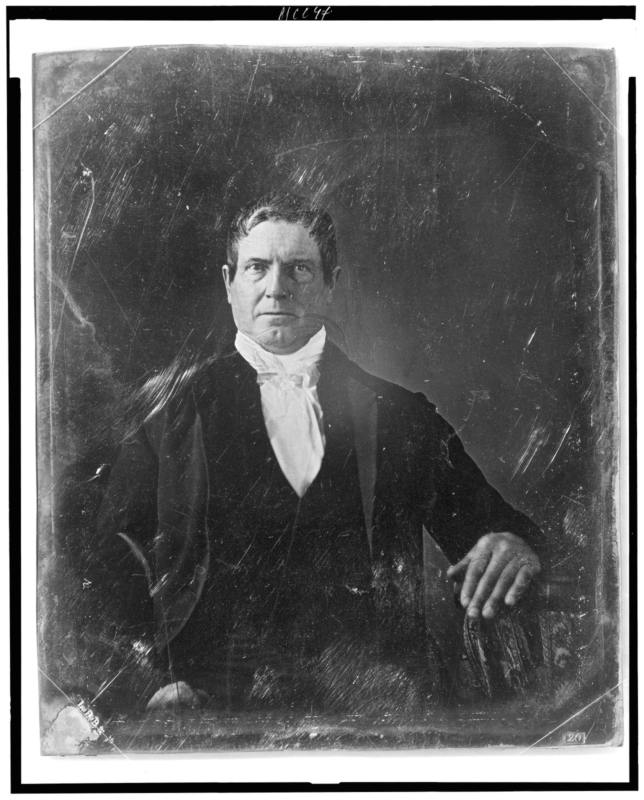 Seated man in dark coat and cravat, daguerreotype portrait, 1844 — historic photograph