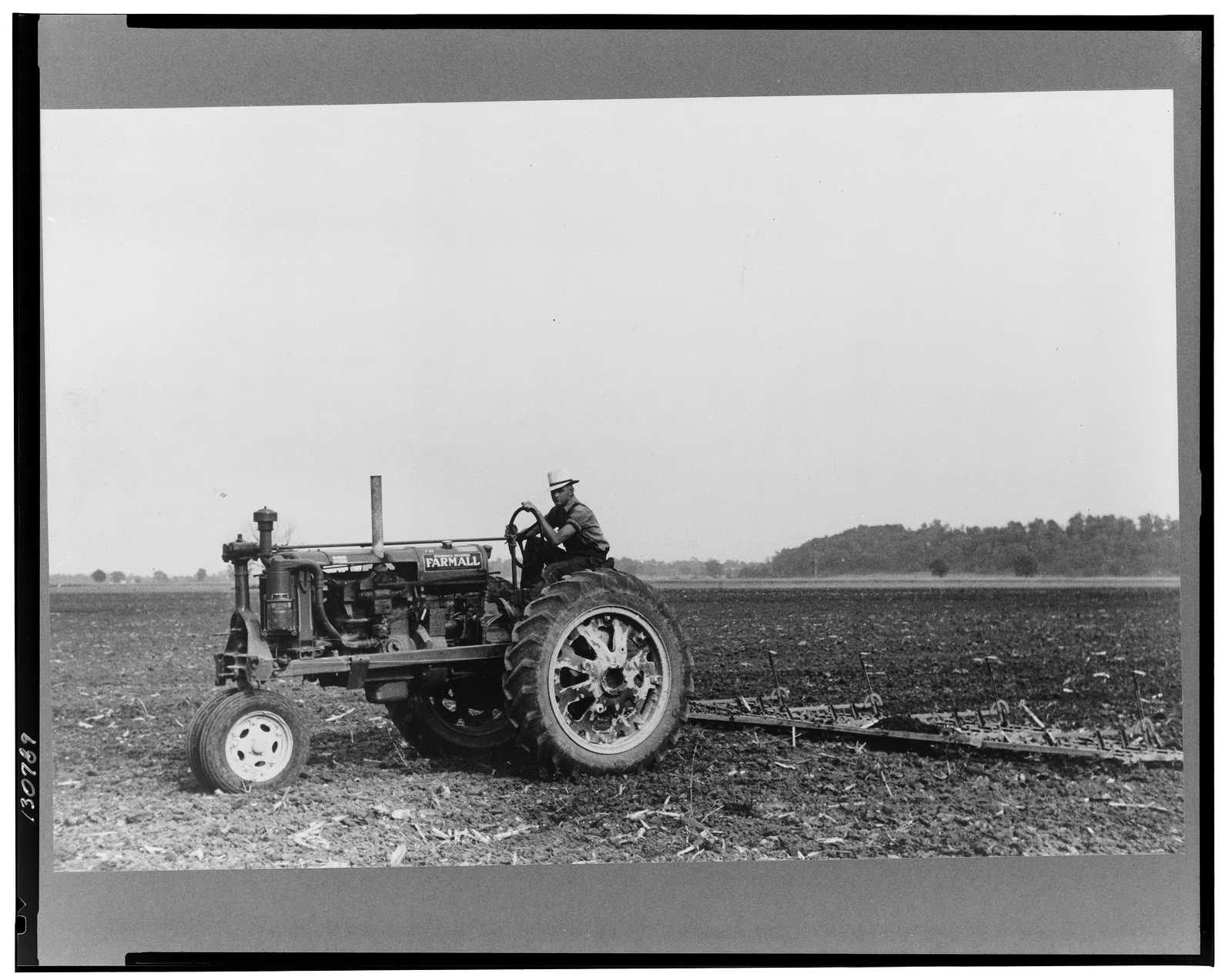 Tractors used in cultivation, Wabash Farms, Indiana, 1938 May. — historic photograph