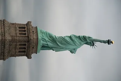 Statue of Liberty torch and arm, image rotated sideways