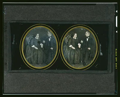 Hand-colored daguerreotype stereo pair of seated woman and standing man
