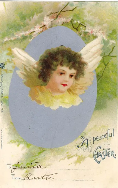 Easter greeting card with angel in blue egg