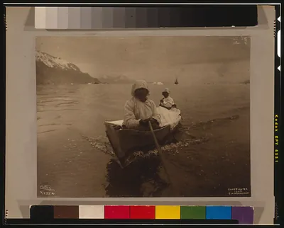 Seal hunters in canoe at Glacier Bay / Curtis.