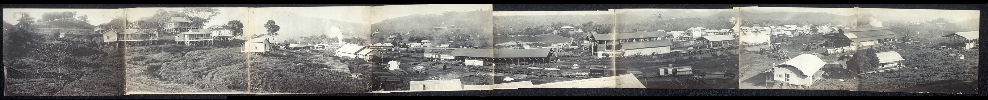 Panoramic black and white view of a Panama town on a hillside — historic image