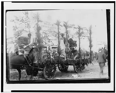 [Horse-drawn float of the Division of Experiment Station of Tuskegee Institute in parade in honor of Teddy Roosevelt]