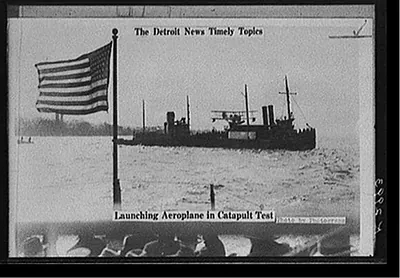 The Detroit news timely topics. Launching aeroplane in catapult test