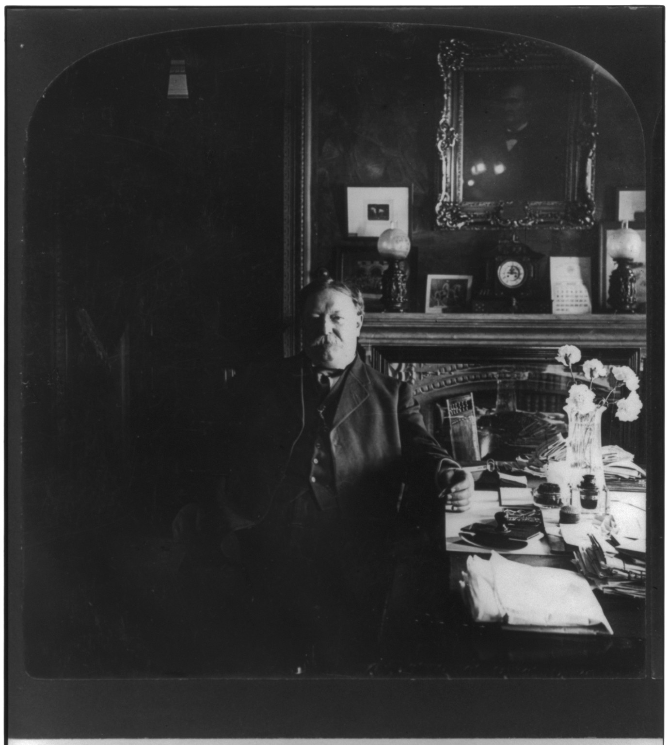 [William Howard Taft, half length, seated, facing slightly left, at his desk in War Dept"]", c1908. — historic photograph