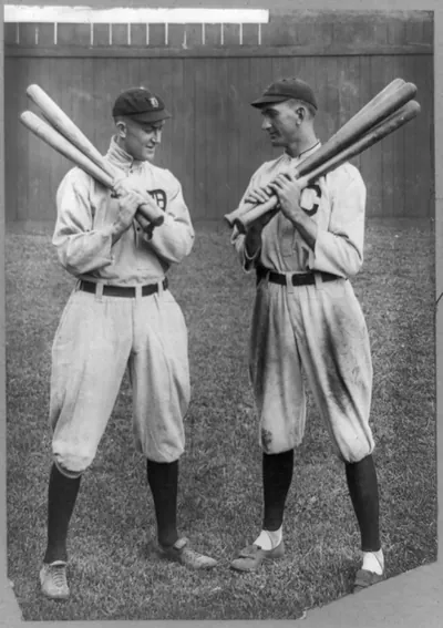 [Ty Cobb, Detroit, and Joe Jackson, Cleveland, standing alongside each other, each holding bats]