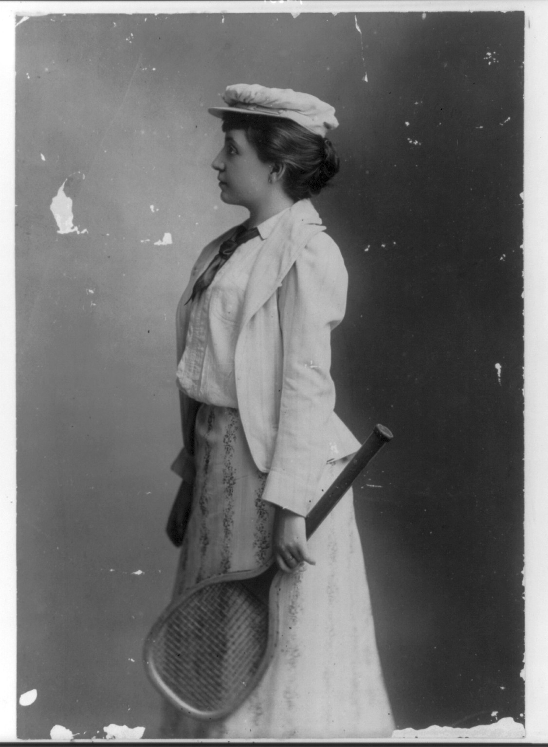 [Street-types of Chicago: young woman with tennis racket] — historic photograph