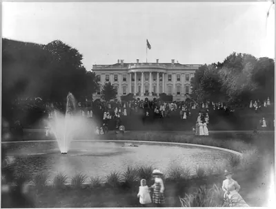 [Wash., D.C. White House looking across pool and South Lawn filled with tourists]