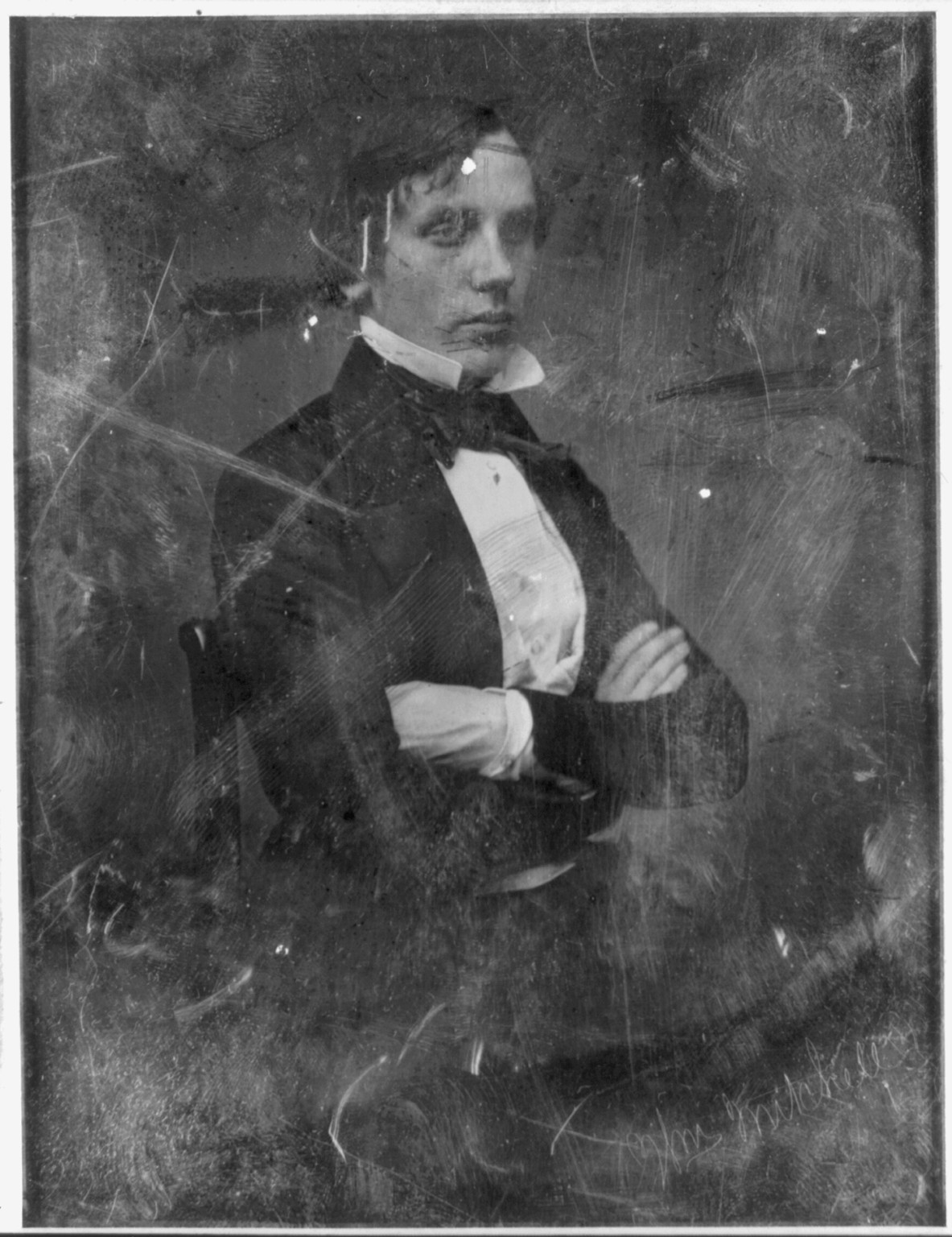 Seated man in dark coat, early photographic portrait, 1844 — historic photograph