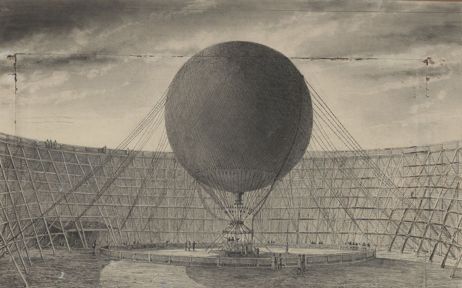 Steam captive balloon inside a wooden scaffold enclosure — historic image